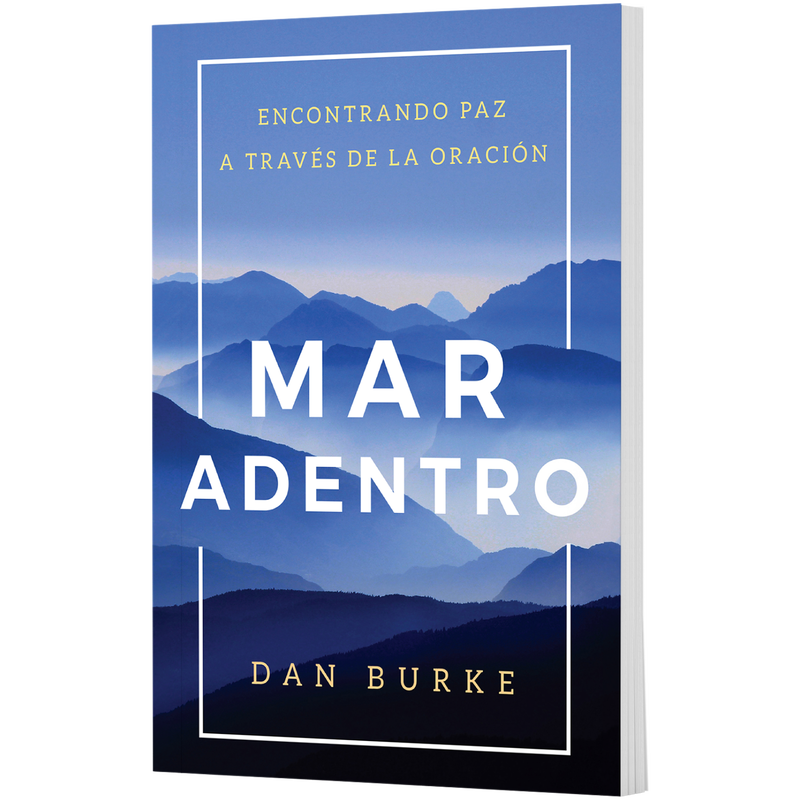 Book cover titled Into the Deep: Finding Peace Through Prayer by Dan Burke, featuring a landscape of blue mountains. image number 0