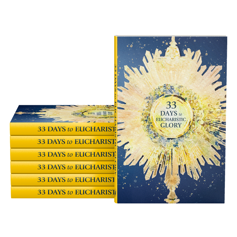 Stacked copies of a book titled 33 Days to Eucharistic Glory, featuring a golden monstrance on the cover with a blue background. image number 0